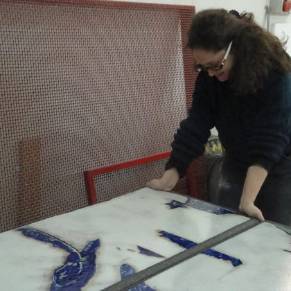 Italia all'uscita del portone dal forno